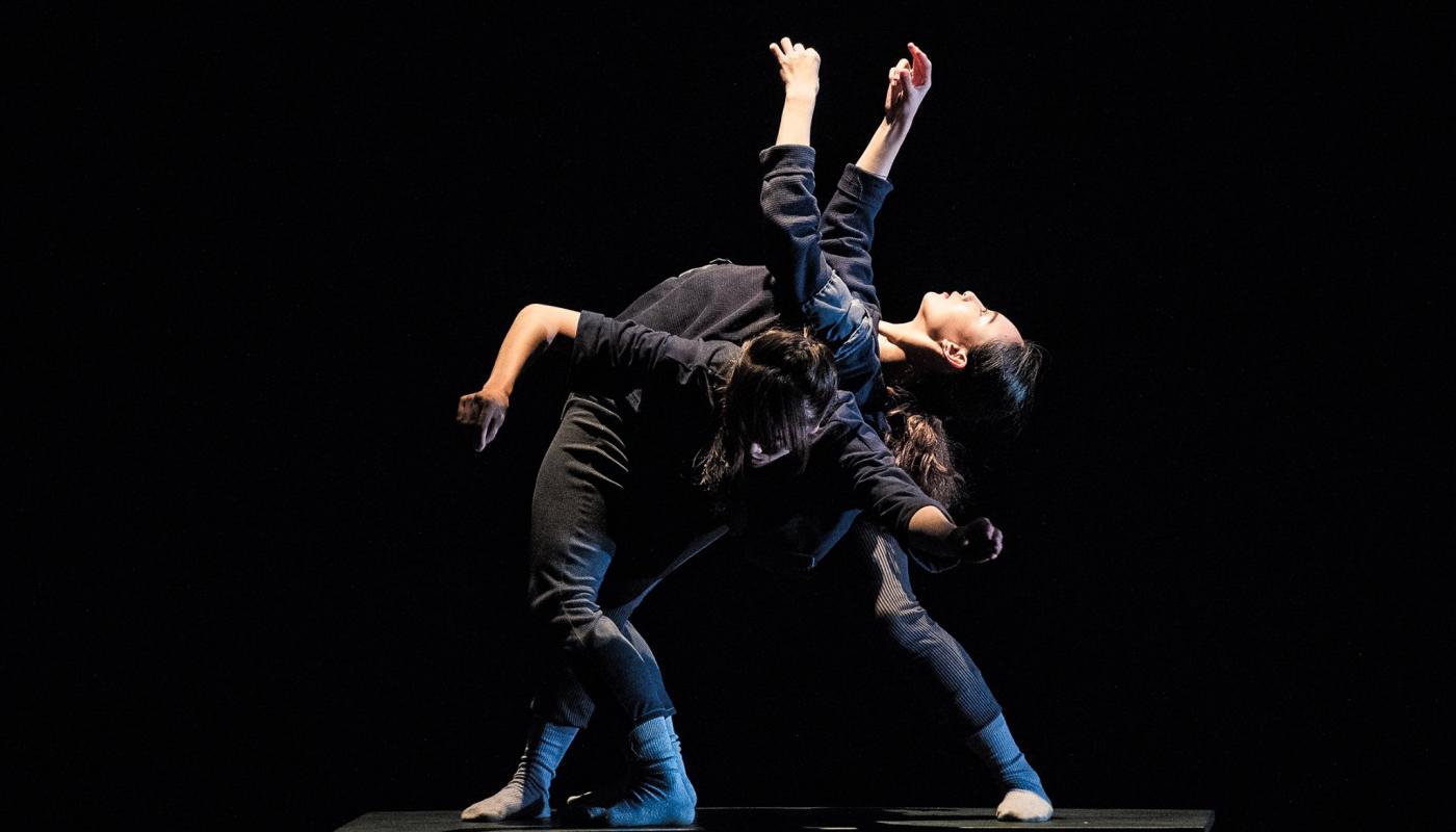 Resident Island Dance Theatre by Huang Jyong Jhe 2 Two women dancing, one leaning on the other with their hands in the air