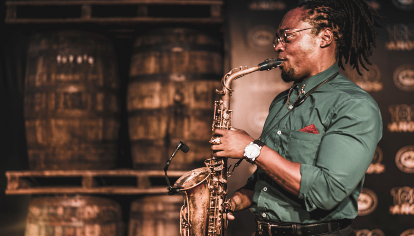 A man playing the saxaphone