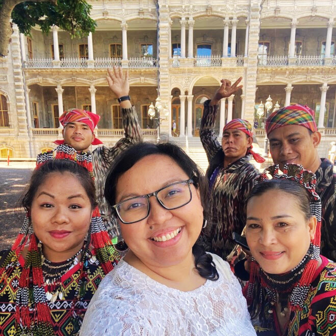 The author, Maddie Castillo, and Helobung Five people, 4 in traditional Tboli clothes, posing together
