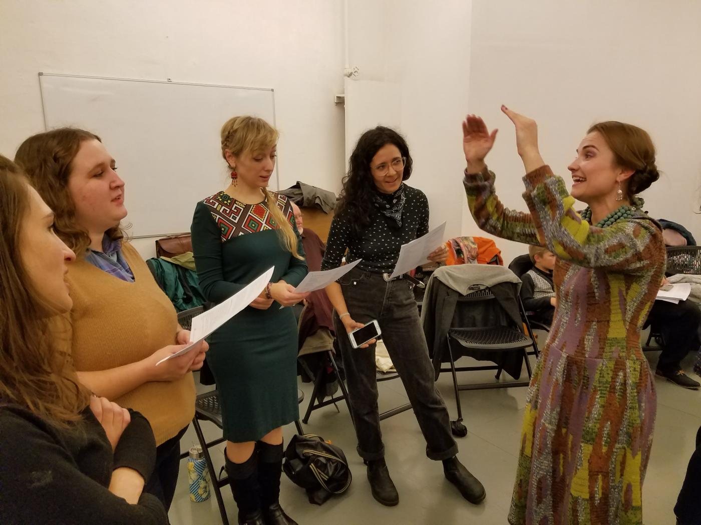 Women participating in a vocal exercise