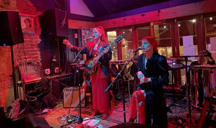 Sofia and Clara Trucco of the Argentine music group Femina perform on stage at a nightclub